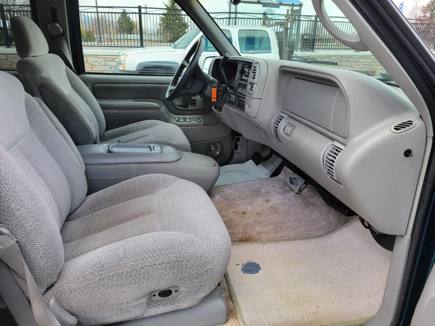 1998 Green /Gray GMC Suburban SLE (3GKFK16R9WG) with an 5.7L V8 engine, 4 Speed Auto transmission, located at 450 N Russell, Missoula, MT, 59801, (406) 543-6600, 46.874496, -114.017433 - 4WD SUV. 5.7L V8 Engine. 4 Speed Automatic Overdrive Transmission. Front and Rear Climate Control. AM FM CD Cassette. Air Cruise. Tilt. Power Front Seats. Power Windows and Locks. Towing. Running Boards. 3rd Row Seating. Because of the Age, financing is not available on this vehicle. - Photo#9